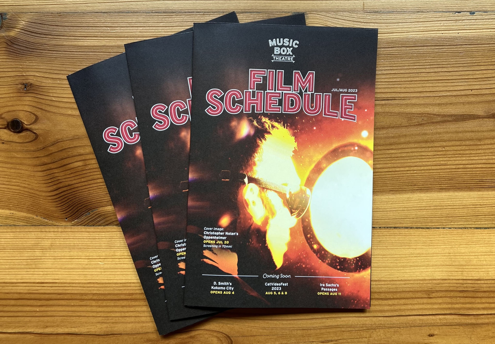 Fanned out film schedule covers featuring Oppenheimer