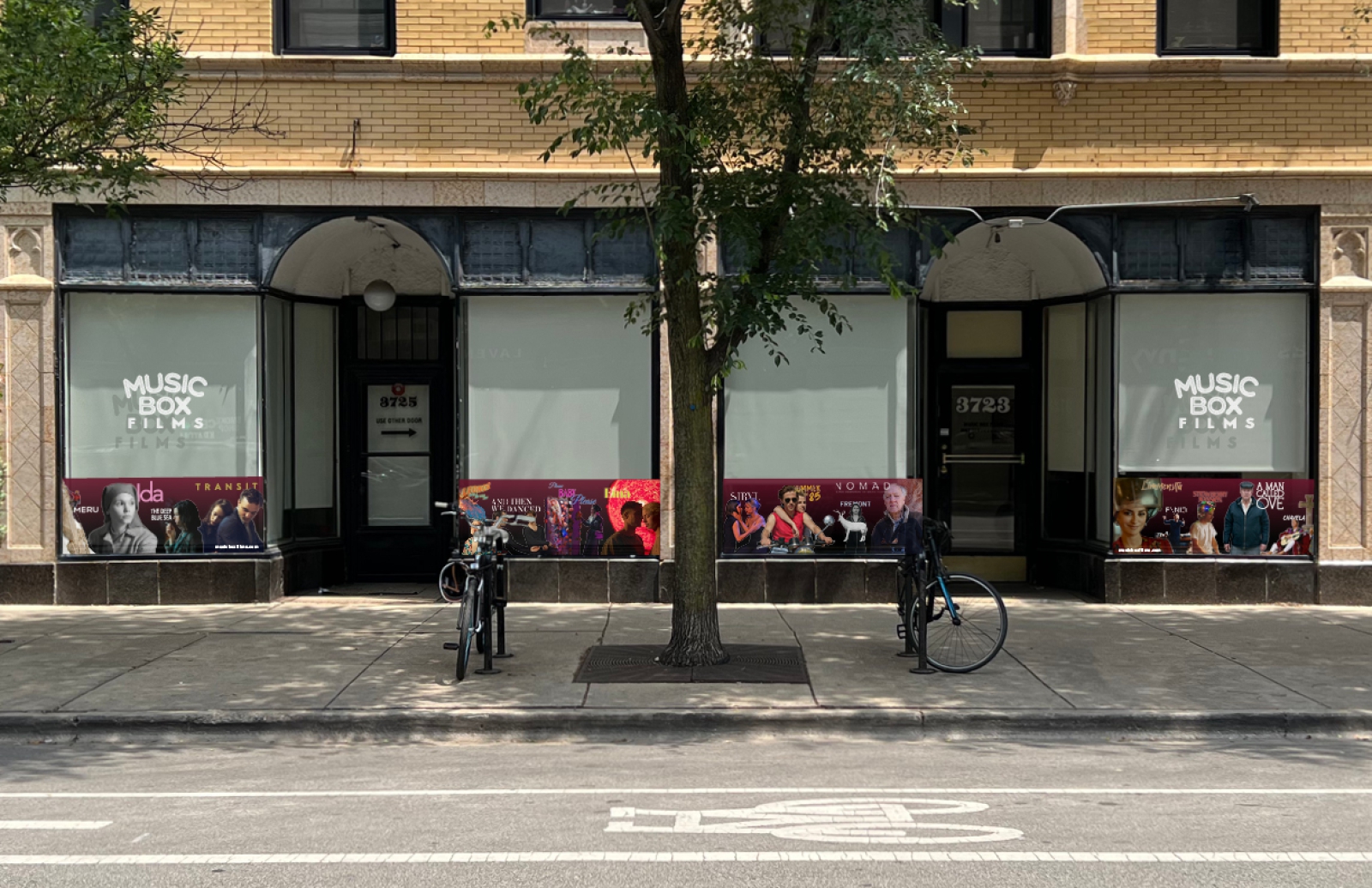 Display of all four banners applied to the Music Box Films office windows